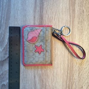 Beachy Coach credit card wristlet