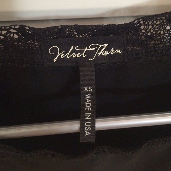 Black top with lace shoulders and sides. - Picture 3 of 3