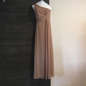 Long, brown, evening gown.