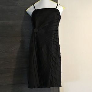 Little black dress. Black silky/satin material.