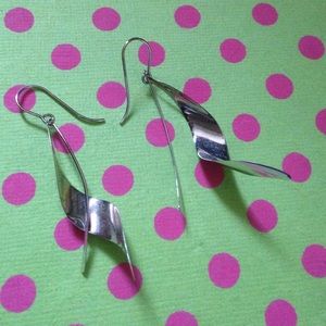 While gold dangle earrings!