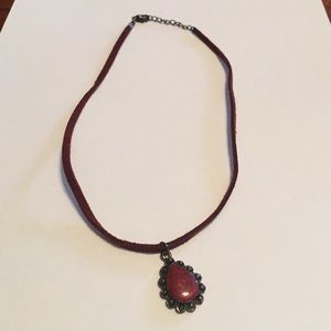 Necklace with maroon pendent