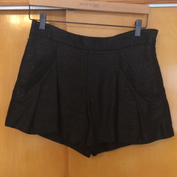NWT**black pleated dress shorts with pockets.