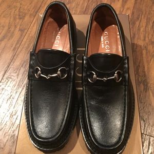 authentic Gucci black loafers with lugged soles