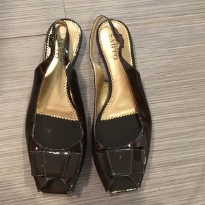 Slip on brown paten shoes with leather sole