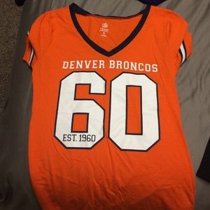 Denver Broncos football shirt.