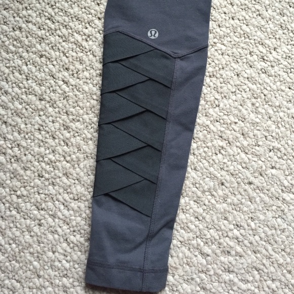 Lululemon dark gray pants with detailed ankle.