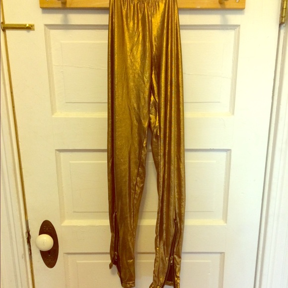 Gold leggings with zippered ankles