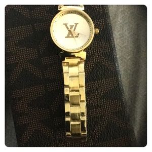 LV gold watch