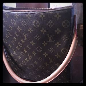 LV leather bag. Beige interior. Never used.