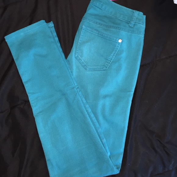 Blue/Green skinny jeans.