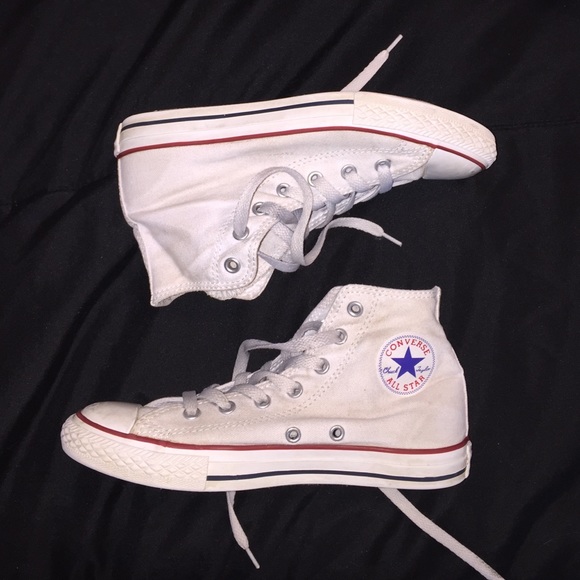 High top white converse.