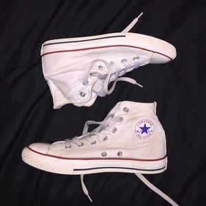 High top white converse.