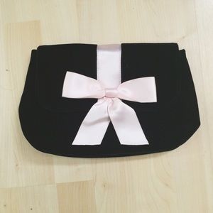 YSL velvet clutch with pink bow