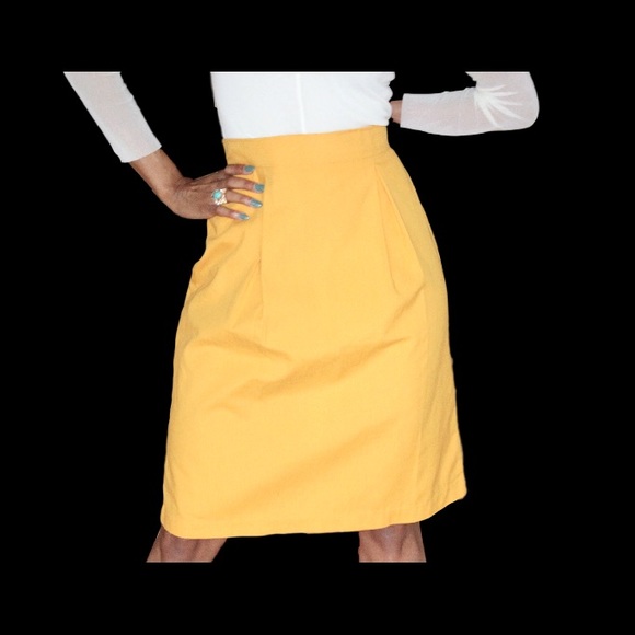 Gold/Yellow skirt with Pleated Front.