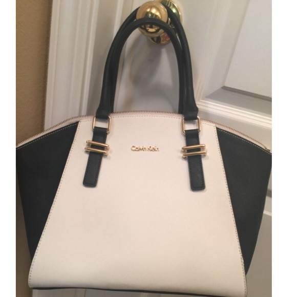 Calvin Klein Handbags - Black & white with gold tone bag