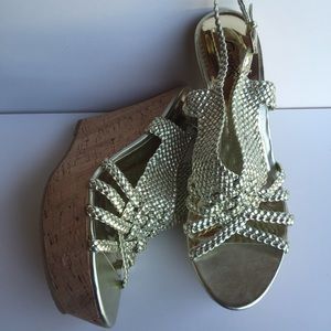 Carlos Horizon Platino Gold Wedge Sandal. 10