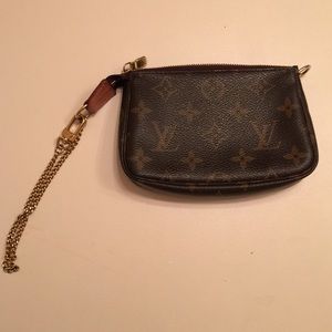 Sold!!Mini 100% authentic has paperwork with it.