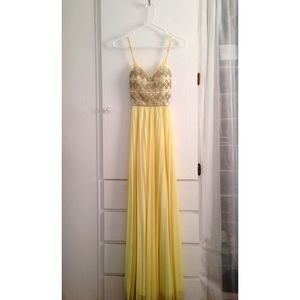 Yellow long prom dress with bedazzled front