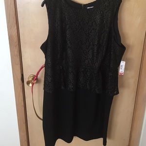 Black dress with gold lace peplum .