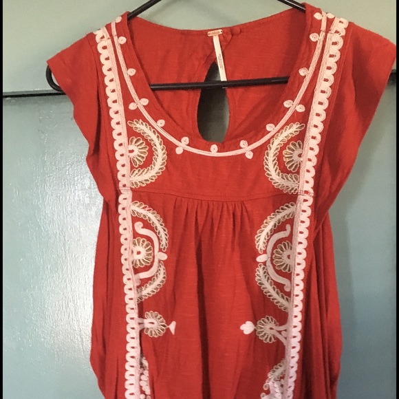 Red free people with white detail shirt