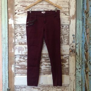 Wine colored skinny jeans