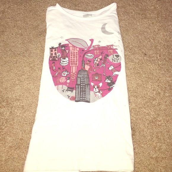 3 girls shirts along with 3 colorful skirts