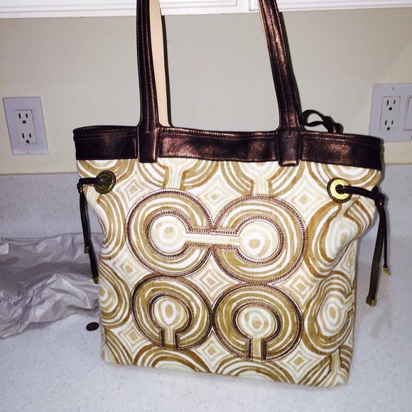 Coach Handbags - Brand new brown and beige Coach purse.