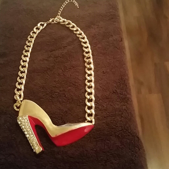 Gold Christian Louboutin necklace