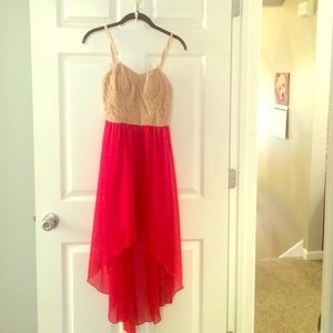 Cream & red, supportive on top, shows off legs