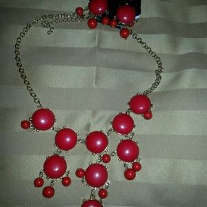 Necklaces with erring s. Necklaces with erring s.