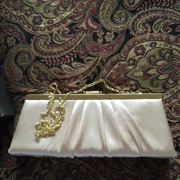 Gorgeous satin beige clutch by Jessica McClintock.