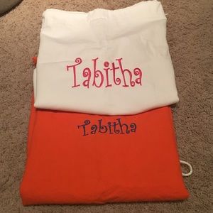 2 monogrammed "Tabitha" laundry bags.
