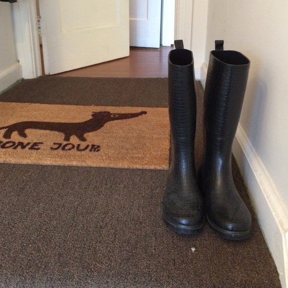 Black Rain Boots. Size 7. Used, In good condition.