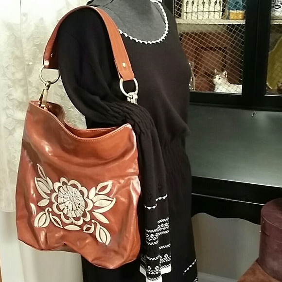 Carlos Santana handbag