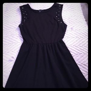 Black dress with studs around shoulder