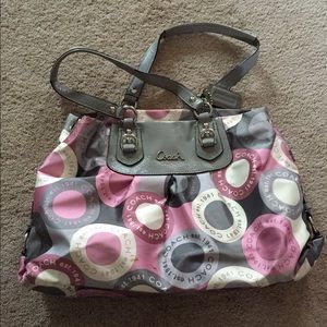 Silver and pink coach purse
