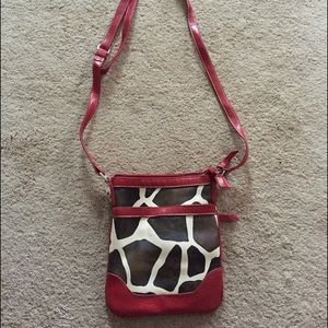Red and giraffe cross body
