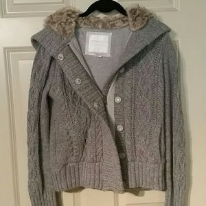 Gray knit jacket with fur hood