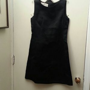 Round neck sleeveless, shift dress.