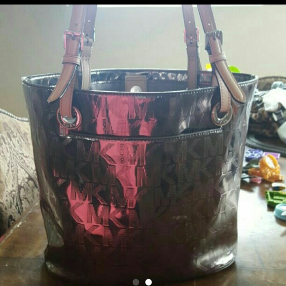 Silver metallic colored michael kors purse
