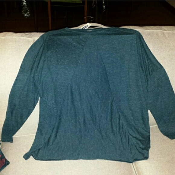 Long sleeve, oversized, thin top.