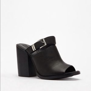 Buckled peep toe mules