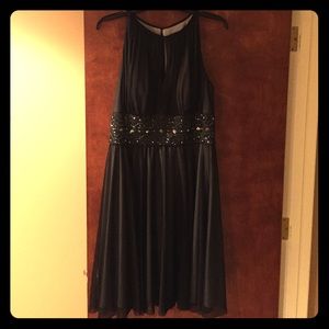 Black sleeveless beaded dress