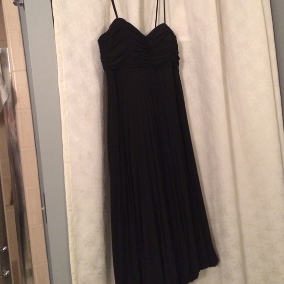 Black cache cocktail dress.