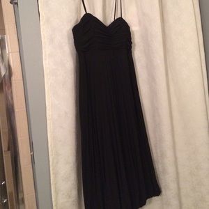 Black cache cocktail dress.