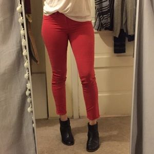 Red J brand cropped jeans.