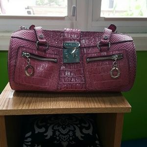 Very cute Guess barrel type bag. Pink