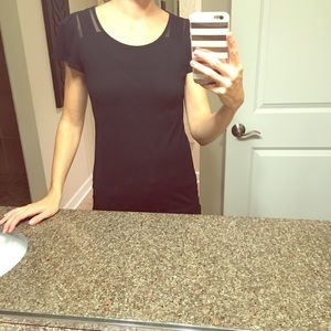 Black tee with see through shoulder/upper back.
