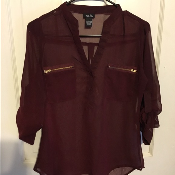 Maroon blouse with gold zippers